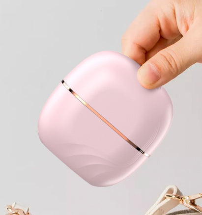 فرشاة فرد الشعر المحمولة للسفر والحقيبة
The Handy Cordless Mini Hair Straightening Comb